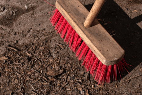 Red bristled yard brush