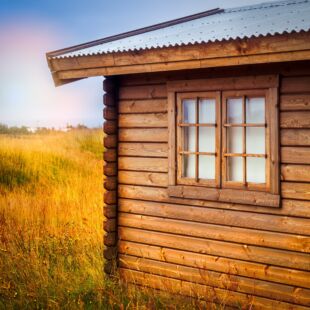 wooden,summer,house,in,golden,fields
